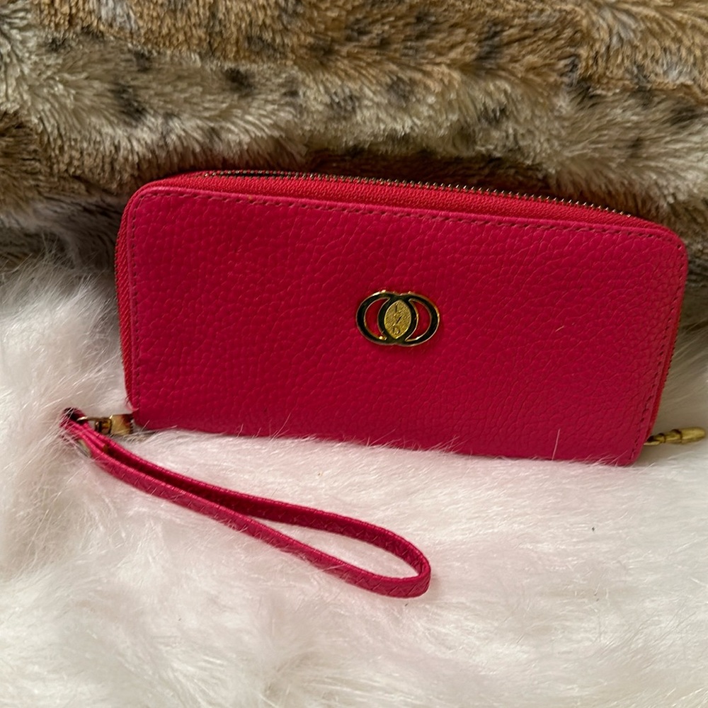 Wallet, hot pink. NEVER USED. No Brand tag. Soft exterior.